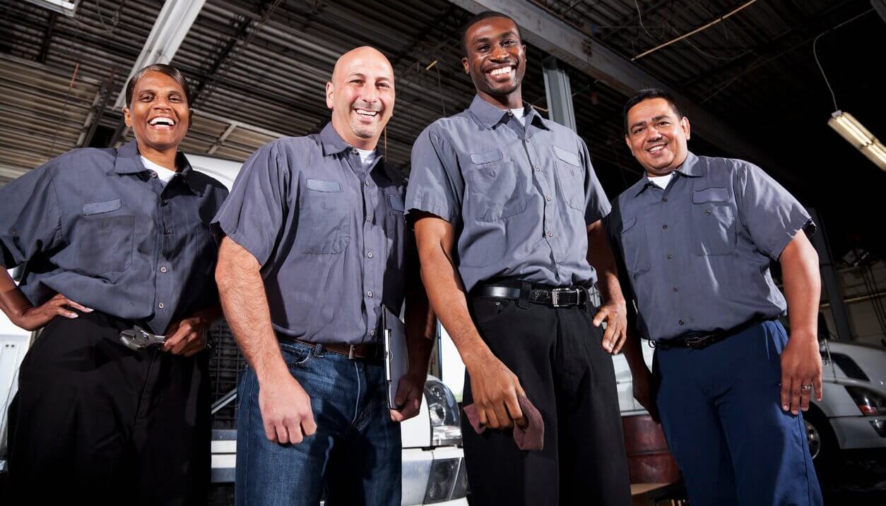 Small business workers in auto shop